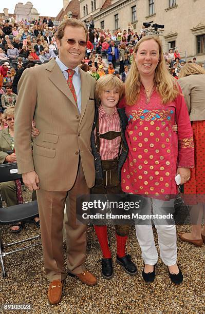 Earl Carl Alban von Schoenburg-Glauchau and his wife Juliet von Schoenburg-Glauchau and son Benedikt attend the Thurn and Taxis castle festival on...