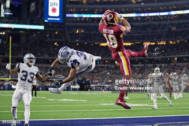 Josh Doctson of the Washington Redskins catches a touchdown pass in the end zone over Byron Jones of the Dallas Cowboys at AT&T Stadium on November...