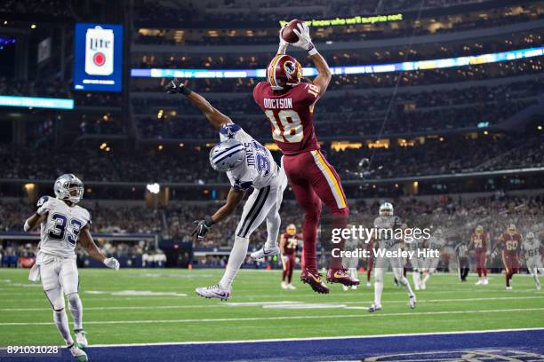 Josh Doctson of the Washington Redskins catches a touchdown pass in the end zone over Byron Jones of the Dallas Cowboys at AT&T Stadium on November...