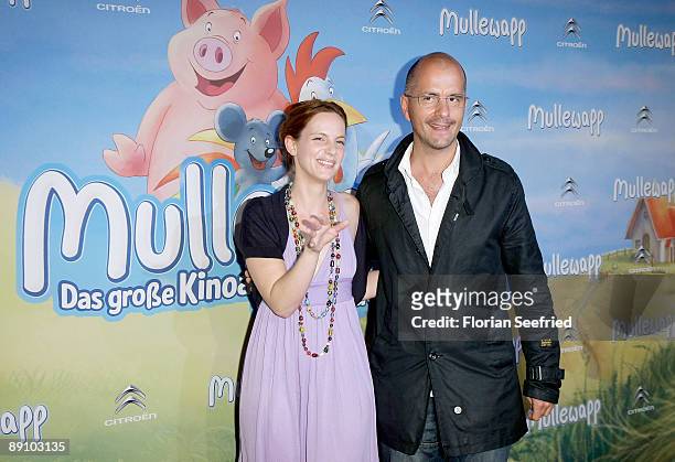 Actor Christoph Maria Herbst and his girlfriend, actress Marie Zielcke attend the Berlin premiere of Mullewapp at UCI Kinowelt Colloseum on July 19,...