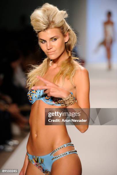 Model walks the runway at the Ed Hardy fashion show at Cabana Grande on July 18, 2009 in Miami, Florida.