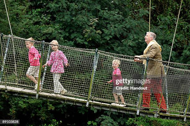 In this handout photo, provided by the Belgian Royal Palace, Prince Emmanuel, Princess Eleonore, Princess Mathilde, Prince Gabriel, Prince Philippe...