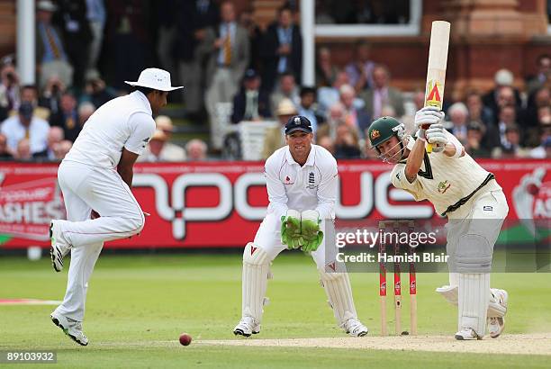 Michael Clarke of Australia hits out as Ravi Bopara of England takes evasive action during day four of the npower 2nd Ashes Test Match between...