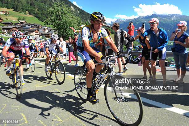 Seven-time Tour de France winner and Kazakh cycling team Astana 's Lance Armstrong of the United States rides in the last kilometers with Swiss...
