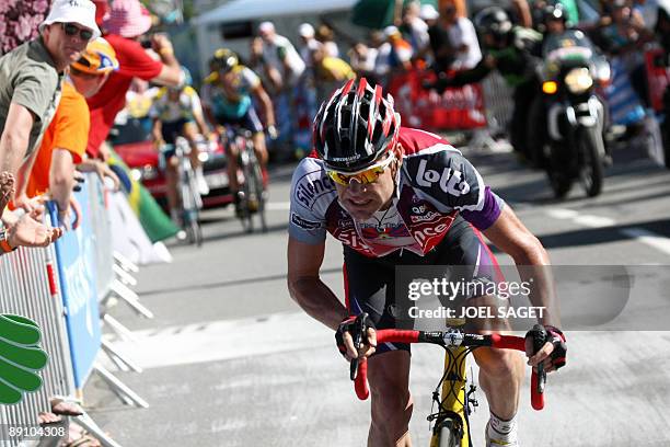 Belgian cycling team Silence-Lotto 's leader Cadel Evans of Australia rides in the last kilometers ahead of seven-time Tour de France winner and...