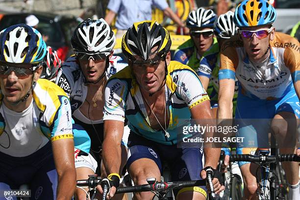 Seven-time Tour de France winner and Kazakh cycling team Astana 's Lance Armstrong of the United States rides with Kazakh cycling team Astana 's...