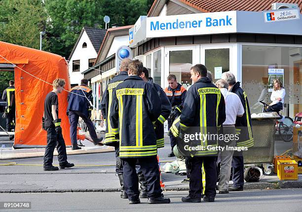 Rescue workers assist in accident clearance on July 19, 2009 in Menden near Arnsberg, Germany. A car rammed a parade in the German town of Menden on...