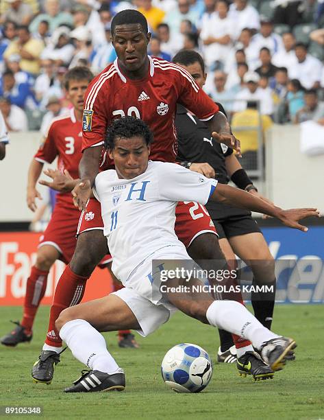 Honduran Mariano Acevedo vies with Canada's Patrice Bernier during a CONCACAF Gold Cup quarterfinal match at Lincoln Financial Field in Philadelphia...