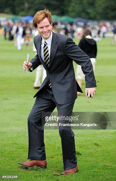 Polo fan treads a divot at Cowdray Park during the Veuve Cliquot Gold Cup Polo match on July 19, 2009 in Midhurst, England.