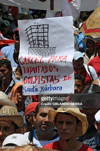 Members of the Honduran Liberal Party protest in support of Honduran ousted President Manuel Zelaya in Santa Barbara departament, 200 km northwest of...