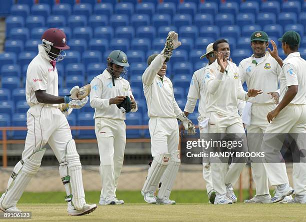 West Indies batsman Chadwick Walton caught by Mahmudullah off Bangladesh bowler Shakib Al Hasan for 1 run as Imrul Kayes , Mushfiqur Rahim and Tamim...