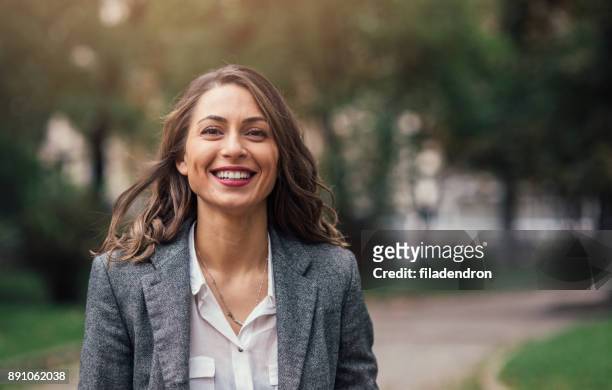 beautiful happy woman - brown hair stock pictures, royalty-free photos & images
