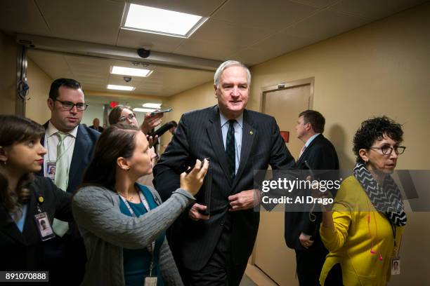 Sen. Luther Strange speaks with reporters as he arrives for the weekly Senate Republican's policy luncheon, on Capitol Hill, December 12, 2017 in...