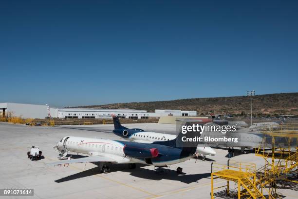 Grupo Aeromexico SAB airplanes sit at the Aeromexico and Delta Air Lines Inc. Joint Maintenance Repair and Overhaul facility in Queretaro, Mexico, on...