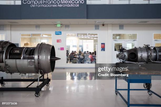 Airplane engines sit on display in front of a classroom at the University of Aeronautics in Queretaro in the town of Colon, Queretaro state, Mexico,...