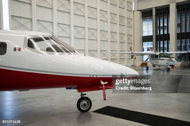 Airplanes sit on display at the University of Aeronautics in Queretaro in the town of Colon, Queretaro state, Mexico, on Tuesday, Nov. 7, 2017. With...