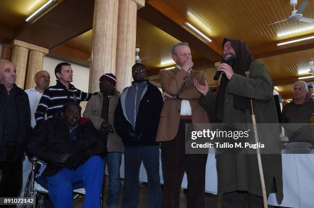 Citta di Palermo owner Maurizio Zamparini and Biagio Conte look on at Missione Speranza e Carità on December 12, 2017 in Palermo, Italy.