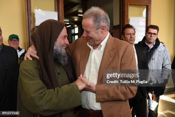 Citta di Palermo owner Maurizio Zamparini and Biagio Conte look on at Missione Speranza e Carità on December 12, 2017 in Palermo, Italy.