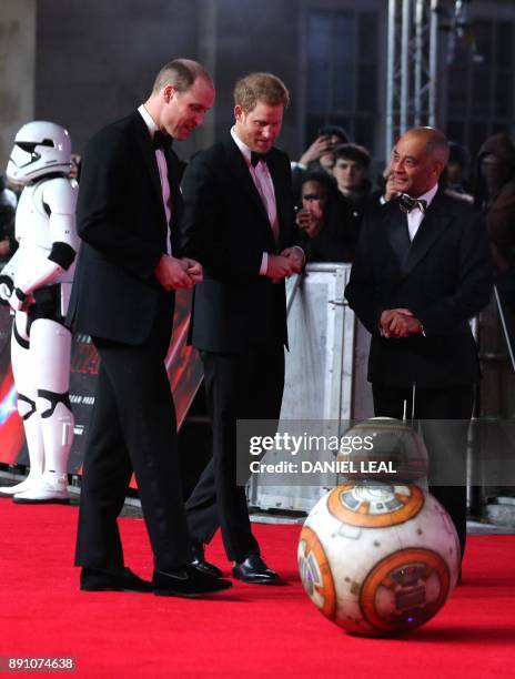 Britain's Prince William , Duke of Cambridge and Prince Harry are greeted by droid BB-8 as they arrive for the European Premiere of Star Wars: The...