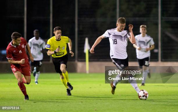 Luc Ihorest of Germany runs with the ball during the U18 friendly match with Serbia on December 12, 2017 in Shefayim, Israel.