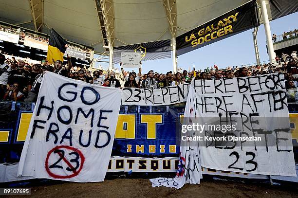 Los Angeles Galaxy supporters hold up signs for David Beckham before the MLS match against AC Milan at The Home Depot Center on July 19, 2009 in...