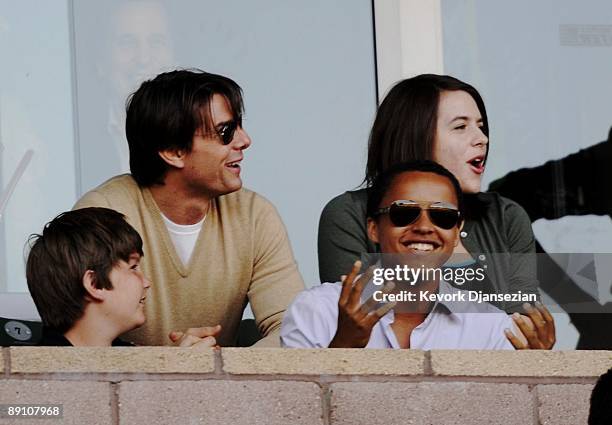 Actor Tom Cruise, son Connor and daughter Isabella react to a missed goal by the Los Angeles Galaxy during the MLS game against AC Milan at The Home...