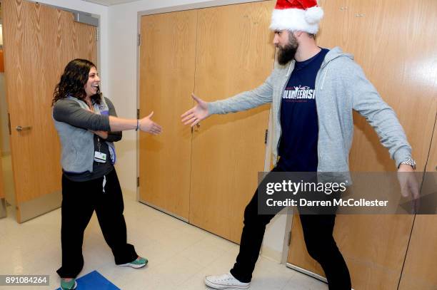 Boston Children's Hospital Marisa Silva RN,BSN,CPN, is surprised by New England Patriot Alumni Sebastian Vollmer with Super Bowl LII tickets at...