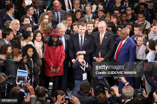 United Nations Secretary General Antonio Guterres , French President Emmanuel Macron , World Bank President Jim Yong Kim and President of the Comores...