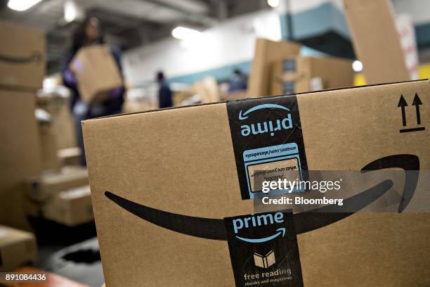 An Amazon.com Inc. Package sits before delivery at the United States Postal Service Joseph Curseen Jr. And Thomas Morris Jr. Processing and...