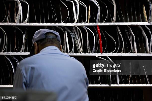 Letter carrier prepares mail for delivery at the United States Postal Service Joseph Curseen Jr. And Thomas Morris Jr. Processing and distribution...