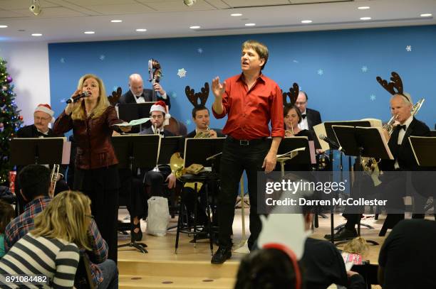 Amanda Carr and Keith Lockhart at the Boston Pops Holiday Concert at Boston Children's Hospital December 12, 2017 in Boston, Massachusetts.