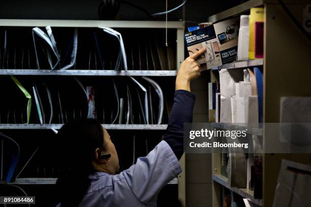 Letter carrier prepares mail for delivery at the United States Postal Service Joseph Curseen Jr. And Thomas Morris Jr. Processing and distribution...