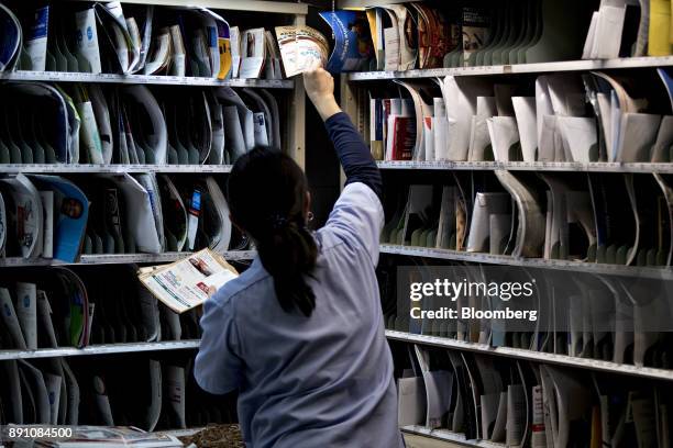 Letter carrier prepares mail for delivery at the United States Postal Service Joseph Curseen Jr. And Thomas Morris Jr. Processing and distribution...