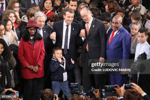 United Nations Secretary General Antonio Guterres , French President Emmanuel Macron , World Bank President Jim Yong Kim and President of the Comores...