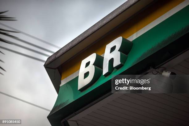 Signage is displayed outside a Petrobras Distribuidora SA gas station in Sao Paulo, Brazil, on Monday, Dec. 11, 2017. Petroleo Brasileiro SA is...