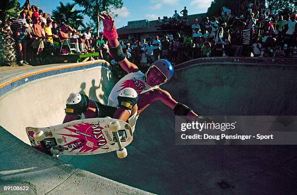 Christian Hosoi does a frontside grind in the keyhole pool during the National Skateboarding Association competition at the Del Mar Skate Ranch in...