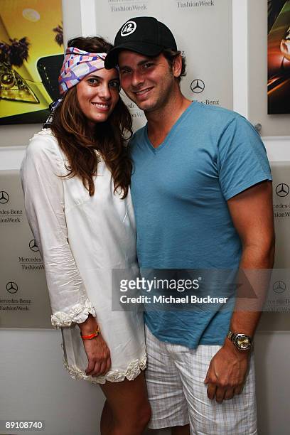 Jillian Sanz and Michael Sheehan pose during Mercedes-Benz Fashion Week Swim 2010 at The Raleigh on July 19, 2009 in Miami Beach, Florida.