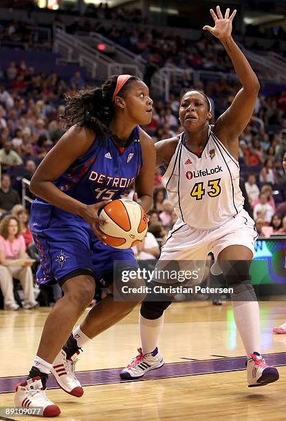 Le'coe Willingham of the Phoenix Mercury defends against Kara Braxton of the Detroit Shock during the WNBA game at US Airways Center on July 18, 2009...