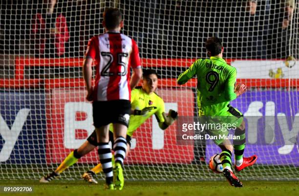 Christian Doidge of Forest Green Rovers scores a penalty during the Emirates FA Cup Second Round Replay between Exeter City and Forest Green at St...