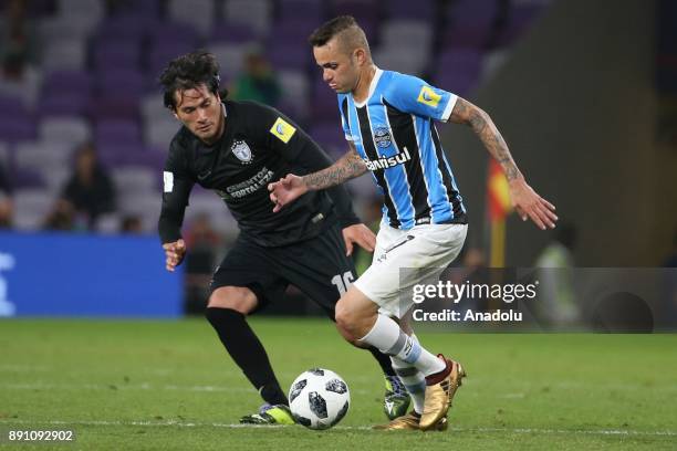 Luan De Jesus Vieira of Gremio in action against Jorge Hernandez of Pachuca during the 2017 FIFA Club World Cup semi-final soccer match between...