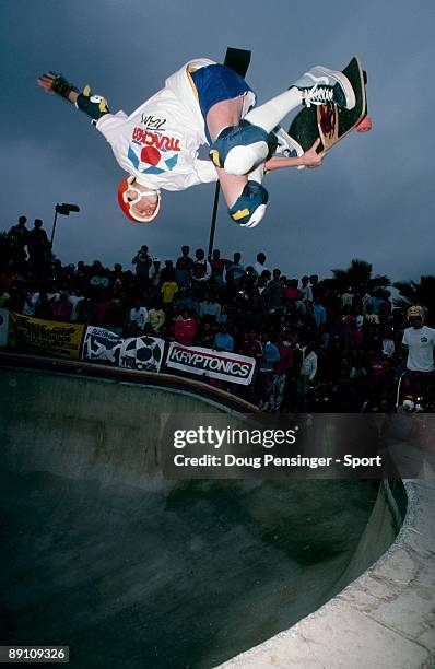 Tony Hawk, riding for Powell Peralta Skateboards, does a mute air in the keyhole pool as he competes in the National Skateboarding Association event...