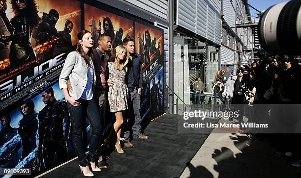 Actors Rachel Nichols, Marlon Wayans, Sienna Miller and Channing Tatum pose during a press conference for 'G.I. Joe The Rise Of The Cobra' at Simmer...