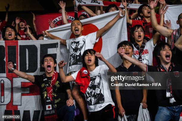 Fans of Urawa Reds enjoy the atmosphere during the FIFA Club World Cup UAE 2017 fifth place playoff match between Wydad Casablanca and Urawa Reds on...