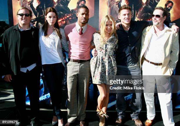 Lorenzo Di Bonaventura, Rachel Nichols, Marlon Wayans, Sienna Miller, Channing Tatum and Stephen Sommers pose for a photo during a Media press...