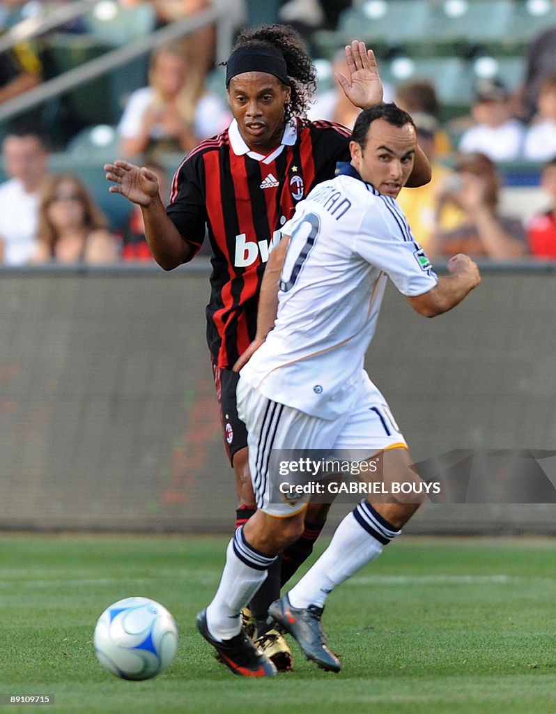 Milan AC Ronaldinho from Brazil (L) figh