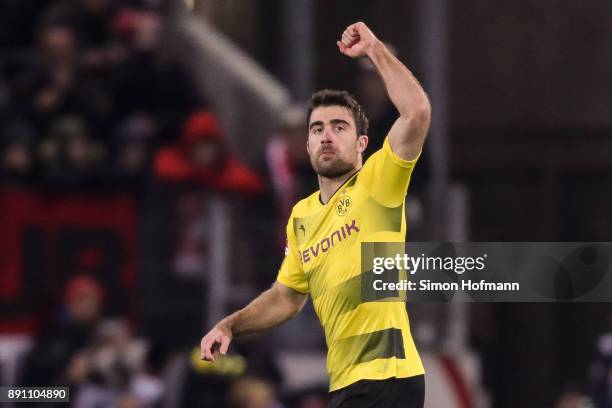 Sokratis of Borussia Dortmund celebrates after scoring his team's first goal to make it 0-1 during the Bundesliga match between 1. FSV Mainz 05 and...