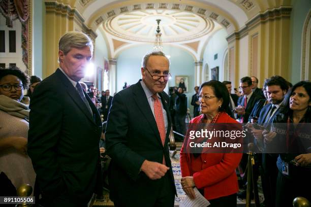 Senate Minority Leader Charles Schumer departs after speaking to reporters about President Donald Trump's recent tweets during a news conference on...