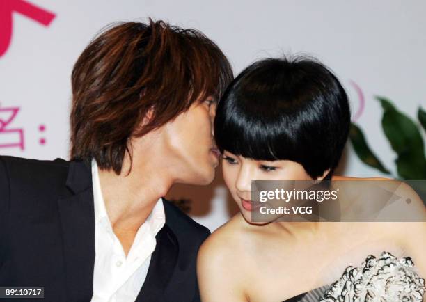 Jerry Yan of F4 and Ella of S.H.E. Attend a press conference to promote "Down With Love" on July 19, 2009 in Hangzhou of Zhejiang Province, China.