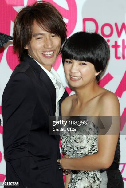 Jerry Yan of F4 and Ella of S.H.E. Attend a press conference to promote "Down With Love" on July 19, 2009 in Hangzhou of Zhejiang Province, China.