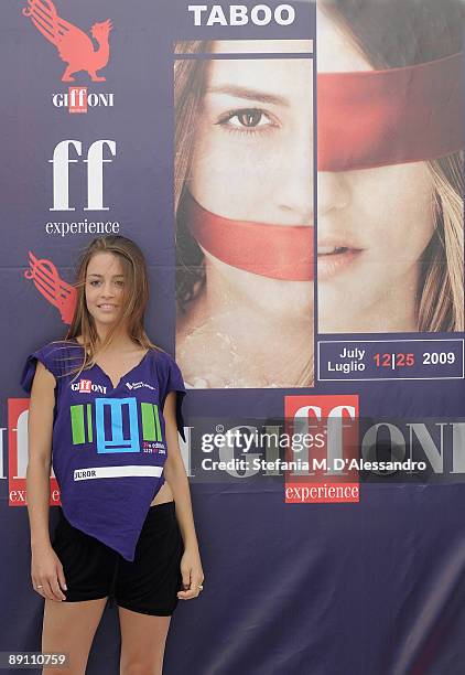 Model Giada Brucia, testimonial of the Giffoni Experience, poses in front of her portrait during the Giffoni Experience on July 19, 2009 in Salerno,...